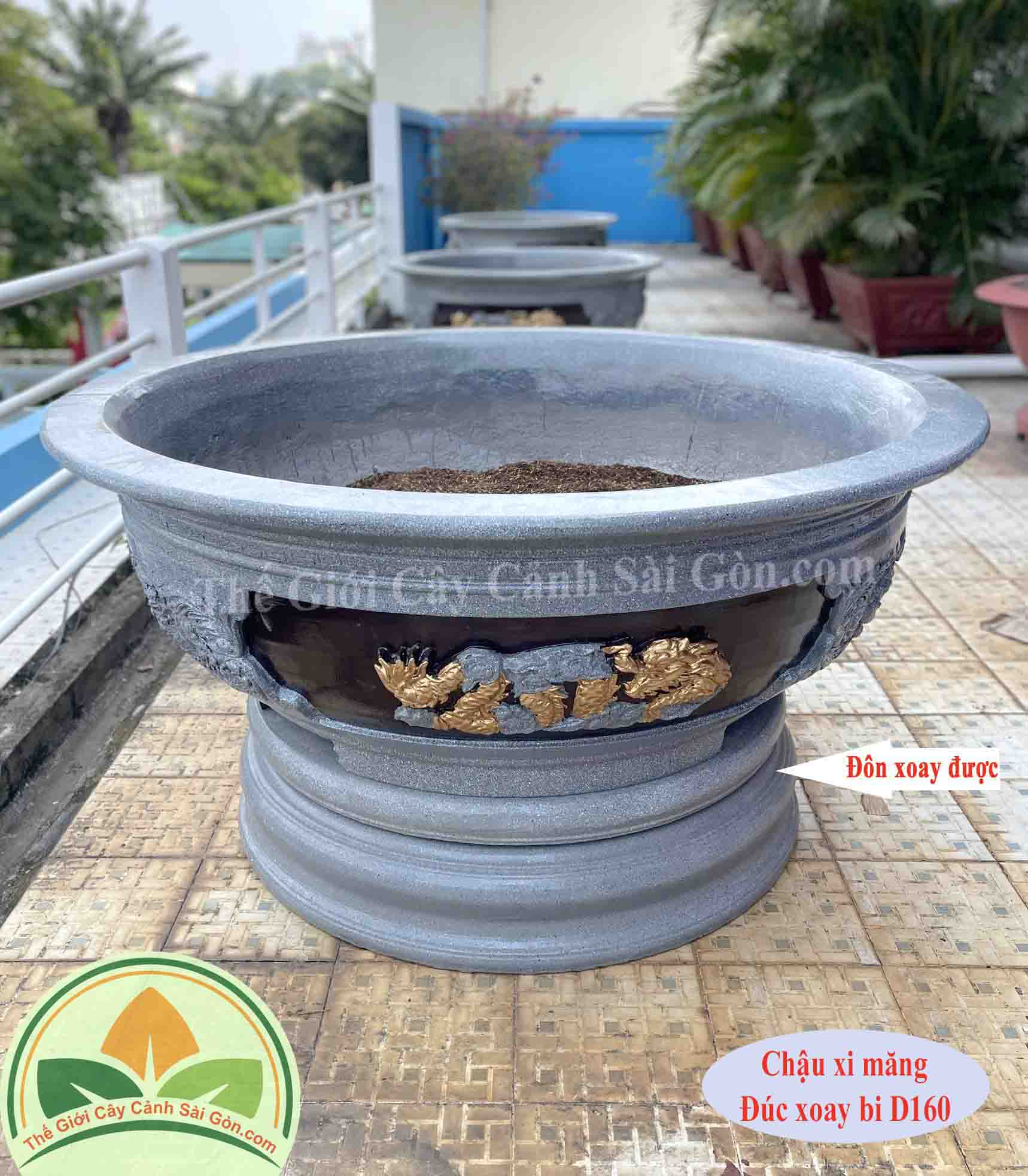 Chậu xi măng đúc xoay bi